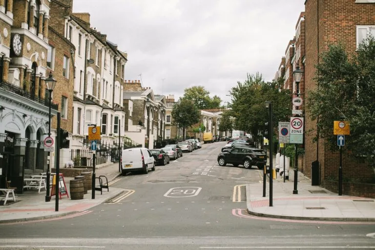 photo of an empty road on a residential area